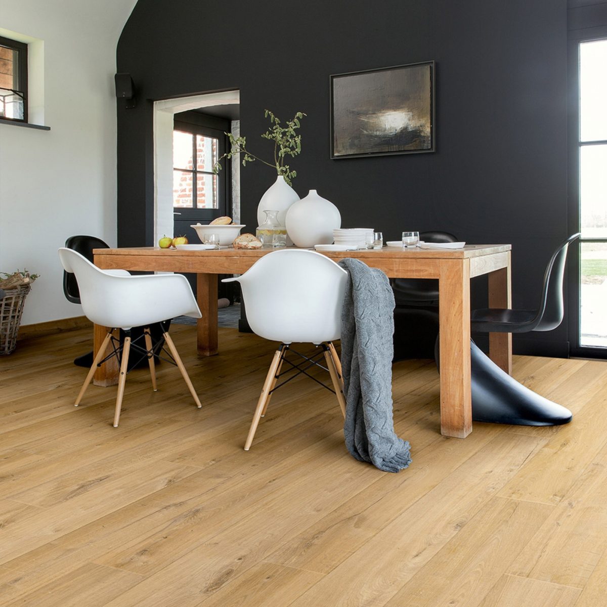 Soft oak style kitchen floor displaying the natural aesthetic of laminate planks